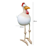 Statue de poule aux yeux expressifs