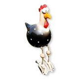 Statue de poule aux yeux expressifs