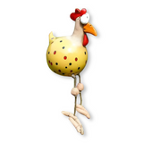 Statue de poule aux yeux expressifs