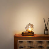 Lampe de table en verre au design de pierre de glace