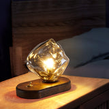 Lampe de table en verre au design de pierre de glace