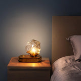 Lampe de table en verre au design de pierre de glace