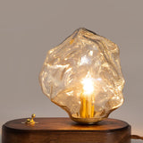 Lampe de table en verre au design de pierre de glace