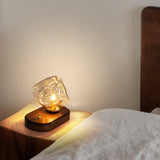 Lampe de table en verre au design de pierre de glace