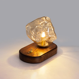 Lampe de table en verre au design de pierre de glace