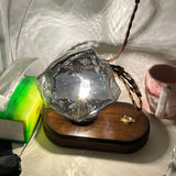 Lampe de table en verre au design de pierre de glace