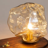 Lampe de table en verre au design de pierre de glace