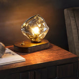 Lampe de table en verre au design de pierre de glace