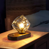 Lampe de table en verre au design de pierre de glace