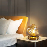 Lampe de table en verre au design de pierre de glace