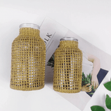 Vase avec une paille
