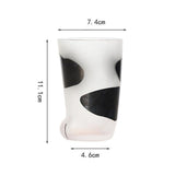 tasse avec motifs de pattes de chat