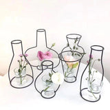 Support en fer raffiné pour vases