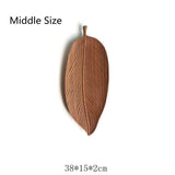 Plateaux en bois design feuille