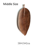 Plateaux en bois design feuille