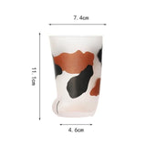tasse avec motifs de pattes de chat