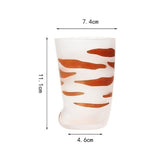tasse avec motifs de pattes de chat