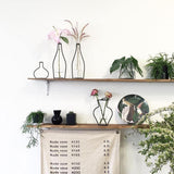 Support en fer raffiné pour vases