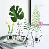 Support en fer raffiné pour vases