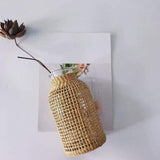 Vase avec une paille